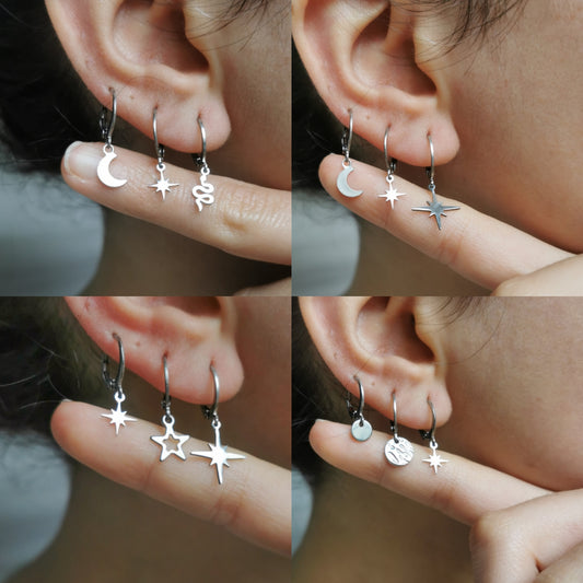 Boucle d'oreille lune et etoile acier argent a l'unité, compositions piercings d'oreilles