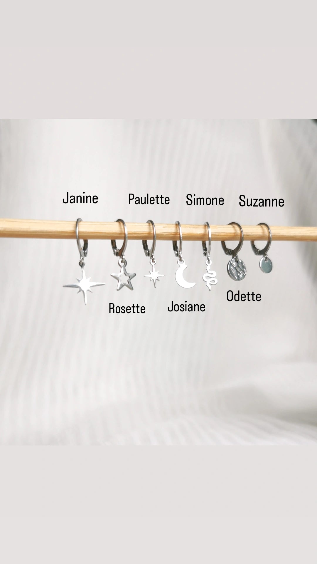 Boucle d'oreille lune et etoile acier argent a l'unité, compositions piercings d'oreilles