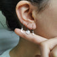 Boucle d'oreille lune et etoile acier argent a l'unité, compositions piercings d'oreilles