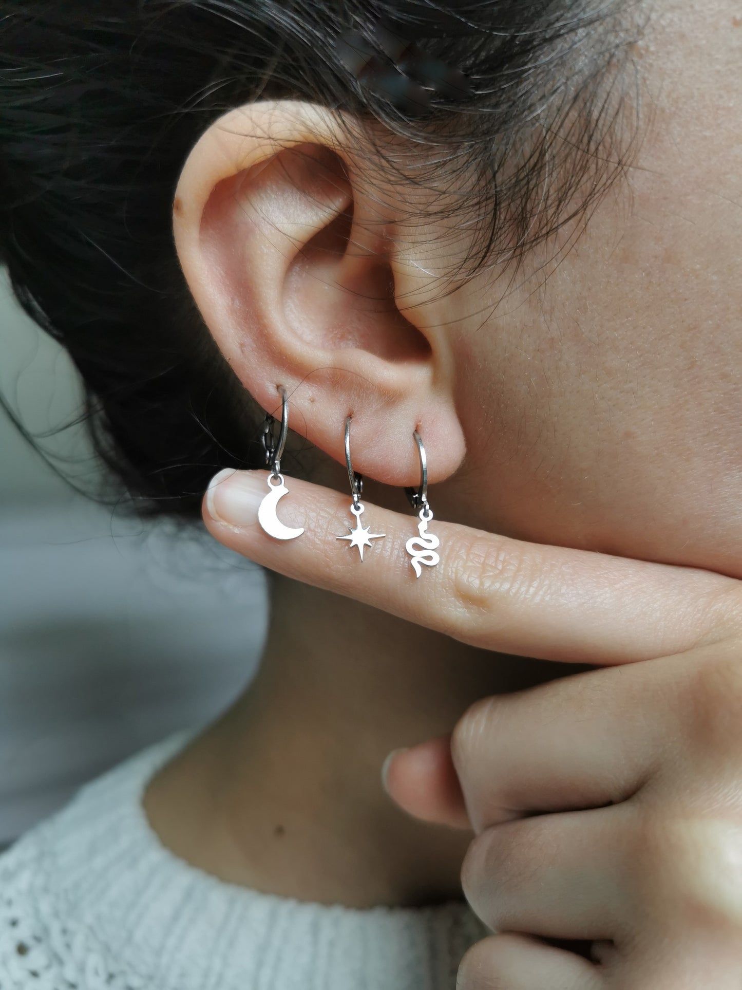 Boucle d'oreille lune et etoile acier argent a l'unité, compositions piercings d'oreilles