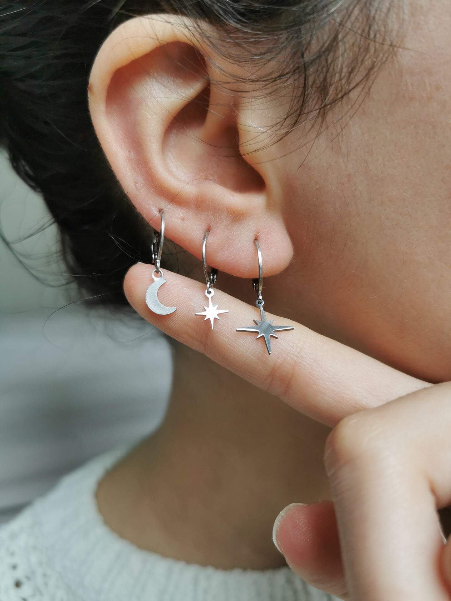 Boucle d'oreille lune et etoile acier argent a l'unité, compositions piercings d'oreilles