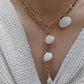 Collier acier et véritable coquillage