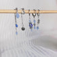 Boucles d'oreilles acier argent, composition piercings d'oreilles argent et bleu, oeil de protection, fait main